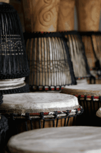 Collection of djembe drums in shop for playing Malinke and West Africa music
